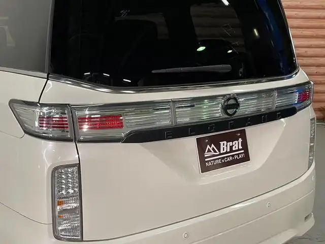 日産 エルグランド 250ハイウェイスターS 福島県 2020(令2)年 2.4万km ブリリアントホワイトパール AIS検査済み/【2502040650】/純正SDナビ/ワンセグテレビ/社外フリップダウンモニター/レーダークルーズコントロール/両側パワースライドドア/純正LEDヘッドライト/ハーフレザーシート/オットマンシート/クリアランスソナー/エマージェンシーブレーキ/オートマチックハイビーム/ワンタッチオートスライドドア/リアサンシェード/社外18インチAW　MID EXCLUSIVE 820F（社外）/TOYOオープンカントリーR/T　225/60-18（新品）（社外）/社外パーツ取付済