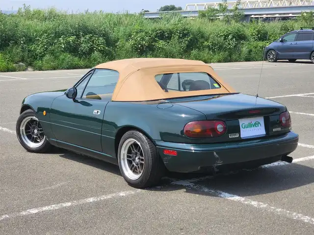 ユーノス ロードスター Vスペシャル 福岡県 1992(平4)年 9.2万km 緑 社外CDステレオ/（Bluetooth、UBS入力）/ナルディ製ステアリング/ナルディ製シフトノブ/ウッドサイドブレーキノブ/Vスペシャルフロアマット/社外14インチアルミホイール/TEIN減衰力調整付車高調/・MAQｓスプリング（70.180.10）/　に組み替え済み/・TEINスプリングは車内積込み/リアスクリーン（ガラス製）/ボディーカバー（車内積み）/泥よけ（車内積み）/トノカバー（車内積み）/取扱説明書/ETC
