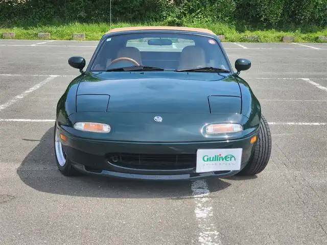 ユーノス ロードスター Vスペシャル 福岡県 1992(平4)年 9.2万km 緑 社外CDステレオ/（Bluetooth、UBS入力）/ナルディ製ステアリング/ナルディ製シフトノブ/ウッドサイドブレーキノブ/Vスペシャルフロアマット/社外14インチアルミホイール/TEIN減衰力調整付車高調/・MAQｓスプリング（70.180.10）/　に組み替え済み/・TEINスプリングは車内積込み/リアスクリーン（ガラス製）/ボディーカバー（車内積み）/泥よけ（車内積み）/トノカバー（車内積み）/取扱説明書/ETC