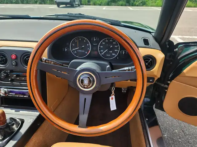 ユーノス ロードスター Vスペシャル 福岡県 1992(平4)年 9.2万km 緑 社外CDステレオ/（Bluetooth、UBS入力）/ナルディ製ステアリング/ナルディ製シフトノブ/ウッドサイドブレーキノブ/Vスペシャルフロアマット/社外14インチアルミホイール/TEIN減衰力調整付車高調/・MAQｓスプリング（70.180.10）/　に組み替え済み/・TEINスプリングは車内積込み/リアスクリーン（ガラス製）/ボディーカバー（車内積み）/泥よけ（車内積み）/トノカバー（車内積み）/取扱説明書/ETC