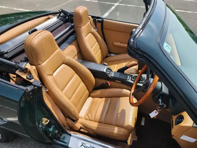 ユーノス ロードスター Vスペシャル 福岡県 1992(平4)年 9.2万km 緑 社外CDステレオ/（Bluetooth、UBS入力）/ナルディ製ステアリング/ナルディ製シフトノブ/ウッドサイドブレーキノブ/Vスペシャルフロアマット/社外14インチアルミホイール/TEIN減衰力調整付車高調/・MAQｓスプリング（70.180.10）/　に組み替え済み/・TEINスプリングは車内積込み/リアスクリーン（ガラス製）/ボディーカバー（車内積み）/泥よけ（車内積み）/トノカバー（車内積み）/取扱説明書/ETC