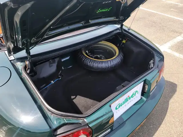 ユーノス ロードスター Vスペシャル 福岡県 1992(平4)年 9.2万km 緑 社外CDステレオ/（Bluetooth、UBS入力）/ナルディ製ステアリング/ナルディ製シフトノブ/ウッドサイドブレーキノブ/Vスペシャルフロアマット/社外14インチアルミホイール/TEIN減衰力調整付車高調/・MAQｓスプリング（70.180.10）/　に組み替え済み/・TEINスプリングは車内積込み/リアスクリーン（ガラス製）/ボディーカバー（車内積み）/泥よけ（車内積み）/トノカバー（車内積み）/取扱説明書/ETC