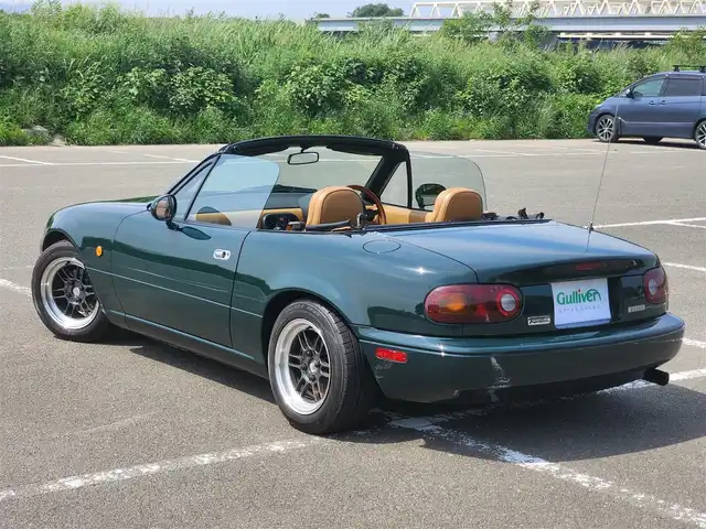 ユーノス ロードスター Vスペシャル 福岡県 1992(平4)年 9.2万km 緑 社外CDステレオ/（Bluetooth、UBS入力）/ナルディ製ステアリング/ナルディ製シフトノブ/ウッドサイドブレーキノブ/Vスペシャルフロアマット/社外14インチアルミホイール/TEIN減衰力調整付車高調/・MAQｓスプリング（70.180.10）/　に組み替え済み/・TEINスプリングは車内積込み/リアスクリーン（ガラス製）/ボディーカバー（車内積み）/泥よけ（車内積み）/トノカバー（車内積み）/取扱説明書/ETC