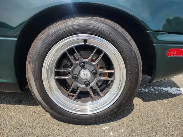 ユーノス ロードスター Vスペシャル 福岡県 1992(平4)年 9.2万km 緑 社外CDステレオ/（Bluetooth、UBS入力）/ナルディ製ステアリング/ナルディ製シフトノブ/ウッドサイドブレーキノブ/Vスペシャルフロアマット/社外14インチアルミホイール/TEIN減衰力調整付車高調/・MAQｓスプリング（70.180.10）/　に組み替え済み/・TEINスプリングは車内積込み/リアスクリーン（ガラス製）/ボディーカバー（車内積み）/泥よけ（車内積み）/トノカバー（車内積み）/取扱説明書/ETC