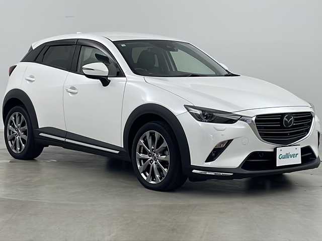 マツダ ＣＸ－３ XD エクスクルーシブモッズ 道央・札幌 2018(平30)年 4.7万km スノーフレイクホワイトパールマイカ ・純正ナビ&CD&DVD&BT/・360°ビューモニター/・i-ACTIVSENSE/・シティブレーキサポート/・ブラインドスポットモニター/・車線逸脱警報システム/・交通標識認識機能/・レーンキープアシスト/・クルーズコントロール/・パーキングセンサー/・アイドリングストップ/・社外前後ドライブレコーダー/・ビルトインETC/・ヘッドアップディスプレイ/・D席メモリ付きパワーシート/・前席シートヒーター/・レザーシート/・ステアリングヒーター/・ステアリングスイッチ/・革巻きステアリング/・パドルシフト/・オートワイパー/・ドアミラーヒーター/・プッシュスタート/・純正フロアマット/・LEDヘッドライト/・LEDフォグランプ/・オートライト/・オートマチックハイビーム/・スマートキー
