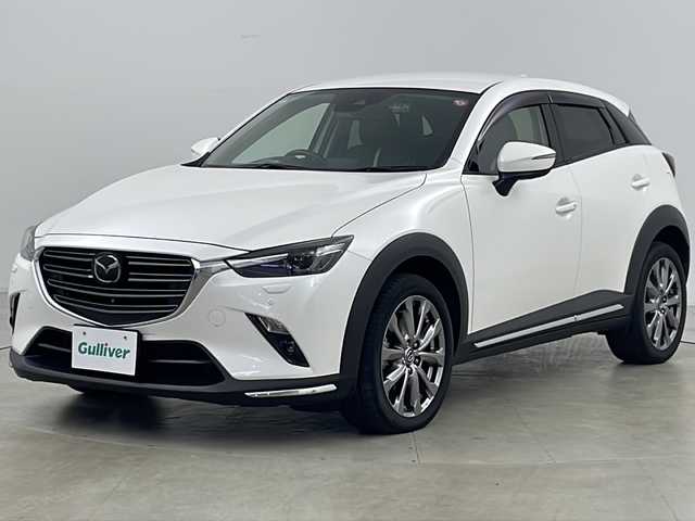マツダ ＣＸ－３ XD エクスクルーシブモッズ 道央・札幌 2018(平30)年 4.7万km スノーフレイクホワイトパールマイカ ・純正ナビ&CD&DVD&BT/・360°ビューモニター/・i-ACTIVSENSE/・シティブレーキサポート/・ブラインドスポットモニター/・車線逸脱警報システム/・交通標識認識機能/・レーンキープアシスト/・クルーズコントロール/・パーキングセンサー/・アイドリングストップ/・社外前後ドライブレコーダー/・ビルトインETC/・ヘッドアップディスプレイ/・D席メモリ付きパワーシート/・前席シートヒーター/・レザーシート/・ステアリングヒーター/・ステアリングスイッチ/・革巻きステアリング/・パドルシフト/・オートワイパー/・ドアミラーヒーター/・プッシュスタート/・純正フロアマット/・LEDヘッドライト/・LEDフォグランプ/・オートライト/・オートマチックハイビーム/・スマートキー