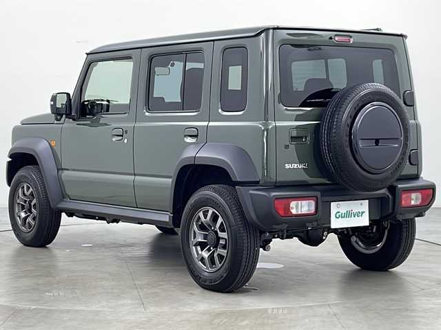 スズキ ジムニー ノマド FC 道央・札幌 2025(令7)年 0.2万km ＤグリーンＭ ・4WD/・社外ディスプレイオーディオ　BT/・バックカメラ/・スマートキー/・プッシュスタート/・スズキセーフティーサポート/・衝突被害軽減ブレーキ/・先行車発進お知らせ/・標識認識機能/・車線逸脱警報/・ふらつき警報/・前後誤発進抑制機能/・アートマチックハイビーム/・ダウンヒルアシストコントロール/・アイドリングストップ/・シートヒーターDN席/・ミラーヒーター/・ビルトインETC/・オートライト/・LEDヘッドライト/・フォグ/・ヘットライトウオッシャー
