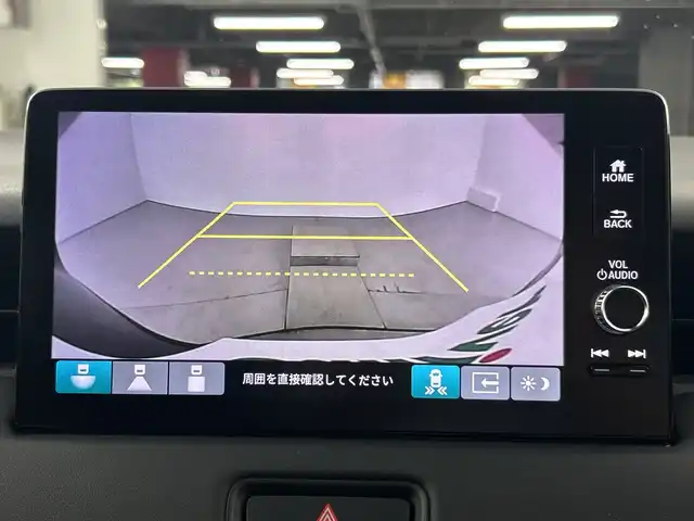 ホンダ ヴェゼル ハイブリッド e:HEV Z 愛知県 2025(令7)年 0.1千km クリスタルブラックパール 登録済未使用車/純正9インチナビ/（AM/FM/フルセグTV/Bluetooth）/バックカメラ/ワイヤレス充電/ホンダセンシング/・衝突軽減ブレーキ/・レーンキープアシスト/・レーダークルーズコントロール/・オートマチックハイビーム/・クリアランスソナー/ブラインドスポットモニター/ETC2.0/シートヒーター/ステアリングヒーター/チップアップシート/ハーフレザー/パドルシフト/パワーバックドア/スマートキー/プッシュスタート/LEDヘッドライト/フロントフォグランプ/ダウンヒルアシスト/純正アルミホイール/横滑り防止装置/電動格納ミラー/ステアリングスイッチ