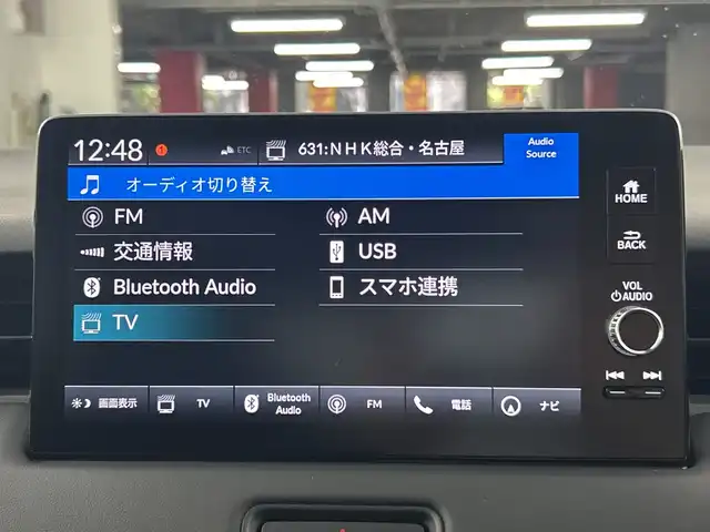 ホンダ ヴェゼル ハイブリッド e:HEV Z 愛知県 2025(令7)年 0.1千km クリスタルブラックパール 登録済未使用車/純正9インチナビ/（AM/FM/フルセグTV/Bluetooth）/バックカメラ/ワイヤレス充電/ホンダセンシング/・衝突軽減ブレーキ/・レーンキープアシスト/・レーダークルーズコントロール/・オートマチックハイビーム/・クリアランスソナー/ブラインドスポットモニター/ETC2.0/シートヒーター/ステアリングヒーター/チップアップシート/ハーフレザー/パドルシフト/パワーバックドア/スマートキー/プッシュスタート/LEDヘッドライト/フロントフォグランプ/ダウンヒルアシスト/純正アルミホイール/横滑り防止装置/電動格納ミラー/ステアリングスイッチ