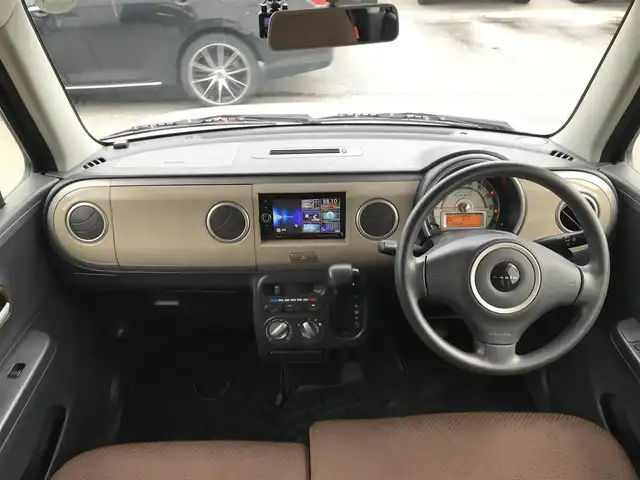 スズキ ラパン G 富山県 2015(平27)年 6.5万km シャンパンピンクPM 社外ナビ/ワンセグTV/Bluetooth/ドライブレコーダー/プッシュスタート/スマートキー/スペアキー１本/シートヒーター/ヘッドライトレベライザー/ベンチシート/パワーウインドウ/ドアバイザー/取扱説明書・保証書
