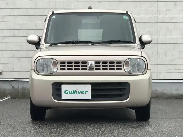 スズキ ラパン G 富山県 2015(平27)年 6.5万km シャンパンピンクPM 社外ナビ/ワンセグTV/Bluetooth/ドライブレコーダー/プッシュスタート/スマートキー/スペアキー１本/シートヒーター/ヘッドライトレベライザー/ベンチシート/パワーウインドウ/ドアバイザー/取扱説明書・保証書