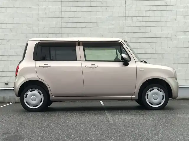 スズキ ラパン G 富山県 2015(平27)年 6.5万km シャンパンピンクPM 社外ナビ/ワンセグTV/Bluetooth/ドライブレコーダー/プッシュスタート/スマートキー/スペアキー１本/シートヒーター/ヘッドライトレベライザー/ベンチシート/パワーウインドウ/ドアバイザー/取扱説明書・保証書