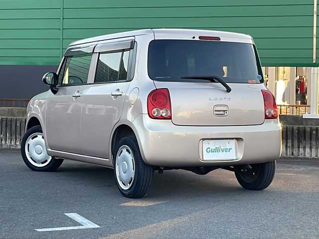 スズキ ラパン G 茨城県 2015(平27)年 6.5万km シャンパンピンクPM 社外ナビ/ワンセグTV/Bluetooth/ドライブレコーダー/プッシュスタート/スマートキー/スペアキー１本/シートヒーター/ヘッドライトレベライザー/ベンチシート/パワーウインドウ/ドアバイザー/取扱説明書・保証書