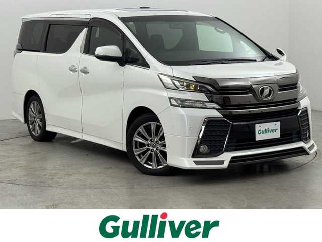 トヨタ ヴェルファイア Z Aエディション 福岡県 2016(平28)年 5.8万km ホワイトパールクリスタルシャイン モデリスタフロントエアロ　/ツインサンルーフ　/純正９型ナビ　/クルーズコントロール　/コーナーセンサー　/両側電動スライドドア　/電動リアゲート　/ビルトインＥＴＣ２．０　/オットマン　/１００ボルト電源　/Ｗエアコン