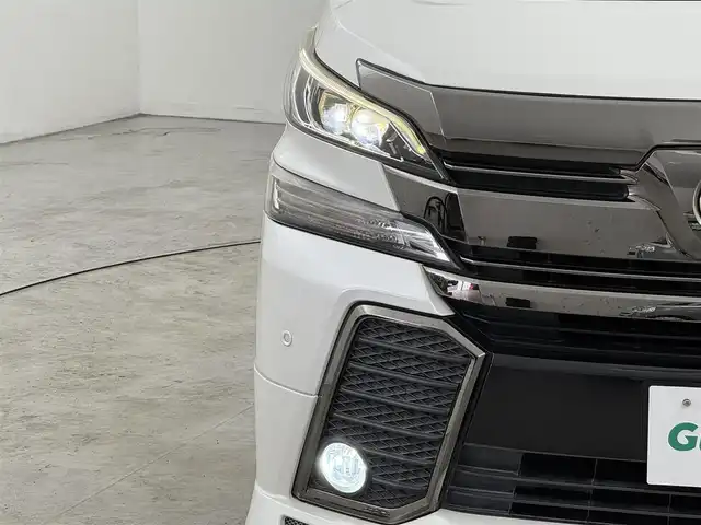トヨタ ヴェルファイア Z Aエディション 福岡県 2016(平28)年 5.8万km ホワイトパールクリスタルシャイン モデリスタフロントエアロ　/ツインサンルーフ　/純正９型ナビ　/クルーズコントロール　/コーナーセンサー　/両側電動スライドドア　/電動リアゲート　/ビルトインＥＴＣ２．０　/オットマン　/１００ボルト電源　/Ｗエアコン