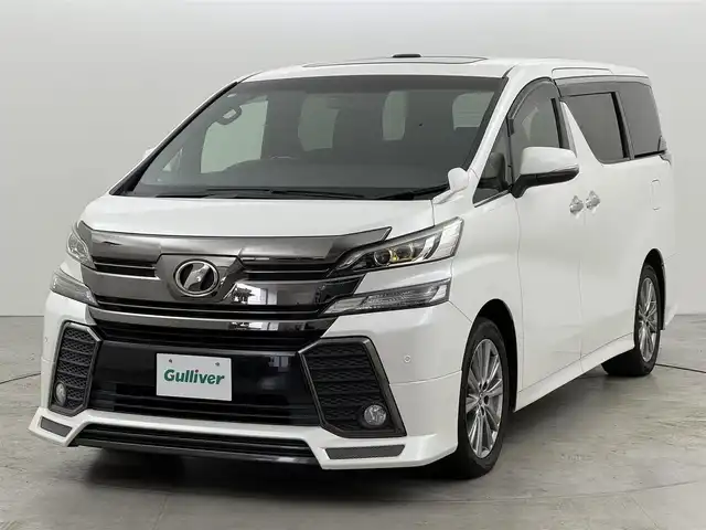 トヨタ ヴェルファイア Z Aエディション 福岡県 2016(平28)年 5.8万km ホワイトパールクリスタルシャイン モデリスタフロントエアロ　/ツインサンルーフ　/純正９型ナビ　/クルーズコントロール　/コーナーセンサー　/両側電動スライドドア　/電動リアゲート　/ビルトインＥＴＣ２．０　/オットマン　/１００ボルト電源　/Ｗエアコン