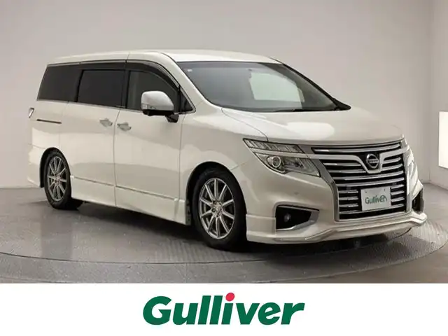 日産 エルグランド 250ハイウェイスター プレミアム 兵庫県 2016(平28)年 7.2万km ブリリアントホワイトパール ワンオーナー/純正HDDナビ/　　CD/DVD/AM/FM/フルセグ/BT/アラウンドビューモニター/両側パワースライドドア/パワーバックドア/クルーズコントロール/オートライト/レザーシート/運転席メモリシート/前席シートヒーター/オットマン/車高調/AC100V充電/マルチファンクションコンソール/ドライブレコーダー/リアサンシェード/エンジンスターター/スペアキー/スマートキー/ETC
