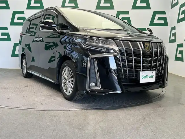 トヨタ アルファード S タイプゴールド 鹿児島県 2021(令3)年 4.5万km ブラック 純正ディスプレイオーディオ　/ＣＤ/ＤＶＤデッキ　/純正フリップダウンモニター　【V12T-R68C】/バックカメラ　/トヨタセーフティセンス　/革巻きステアリング　/ステアリングリモコン　/三眼ＬＥＤヘッドライト　/フロントフォグライト/純正ドアバイザー/前後ドライブレコーダー【DC-DR652】