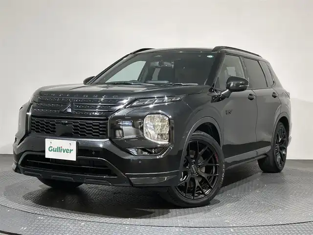 三菱 アウトランダー ＰＨＥＶ P 愛媛県 2023(令5)年 1.4万km ブラックダイヤモンド ・９型ナビ/（フルセグＴＶ・ＢＴ・ＦＭ・ＡＭ・ＵＳＢ・ａｐｐｌｅ　ｃａｒｐｌａｙ）/・全方位カメラ　/・サンルーフ　/・ＤＮ席シートヒーター　/・ＤＮ席パワーシート　/・レーダークルーズコントロール　/・ＥＴＣ２．０　/・前後ドラレコ/・パワーバックドア/・1500W充電/・デジタルインナーミラー/・置くだけ充電/・シートメモリー/・9型後席プライベートモニター