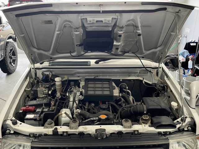 三菱 パジェロ ミニ VR 富山県 2012(平24)年 3.3万km シルキーホワイト ４WD/社外SDナビ(NX711)/フルセグTV/BT・CD・DVD/バックカメラ/純正スピーカー　/背面タイヤ/純正AW/純正フロアマット/シートヒーター/ETC/リモコンキー/保証書・記録簿/取扱説明書
