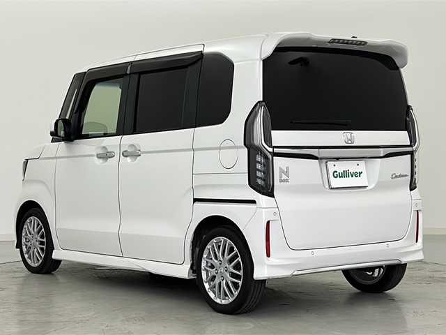 ホンダ Ｎ ＢＯＸ カスタム L ターボ 宮城県 2021(令3)年 5.5万km プラチナホワイトパール 1オーナー/Honda SENSING	/・衝突軽減ブレーキ/・アダプティブクルーズコントロール/・車線維持支援システム	/・オートハイビーム	/純正8型ナビ/・CD.DVD.SD.BT.USB/フルセグTV/両側パワースライドドア/バックカメラ/ハーフレザーシート/前席シートヒーター/パドルシフト/ステアリングスイッチ/ビルトインETC/LEDヘッドライト/LEDフォグランプ/アイドリングストップ/横滑り防止装置/プッシュスタート/スマートキー/ロールサンシェード/シートバックテーブル/純正15inAW/フロアマット