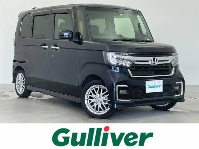 ホンダ Ｎ ＢＯＸ カスタム L ターボ 富山県 2022(令4)年 3.4万km ミッドナイトブルービームM 純正ナビ（AM/FM/CD/DVD/SD/USB/BT）/フルセグTV/バックカメラ/両側パワースライドドア/衝突被害軽減ブレーキ/アダプティブクルーズコントロール/レーンキープアシスト/オートマチックハイビーム/LEDヘッドライト/クリアランスソナー/ハーフレザーシート/前席シートヒーター/純正15インチAW/パドルシフト/ドライブレコーダー前後/ビルトインETC/スマートキー/プッシュスタート/純正フロアマット/アイドリングストップ/保証書