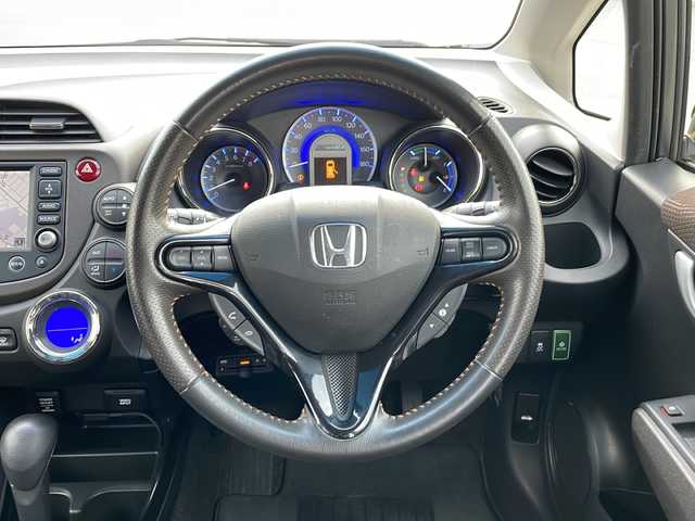 ホンダ フィット シャトル ハイブリッド ナビプレミアムセレ 富山県 2012(平24)年 5.1万km ポリッシュドメタルメタリック 純正HDDナビ/ワンセグTV/バックカメラ/ETC/クルーズコントロール/前後ドライブレコーダー/HID/スマートキー/社外15インチAW/ハーフレザー