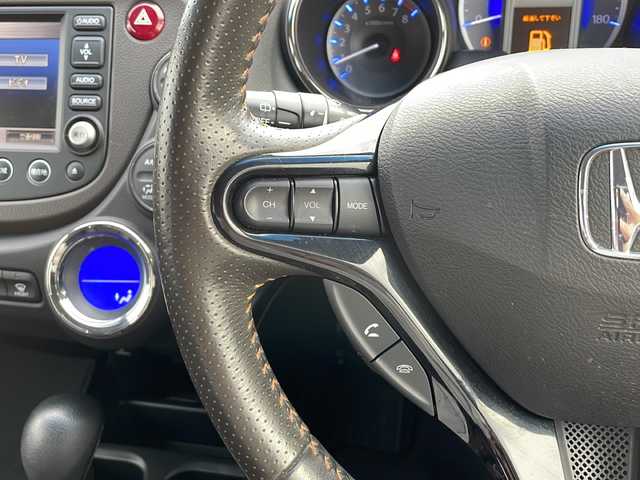 ホンダ フィット シャトル ハイブリッド ナビプレミアムセレ 富山県 2012(平24)年 5.1万km ポリッシュドメタルメタリック 純正HDDナビ/ワンセグTV/バックカメラ/ETC/クルーズコントロール/前後ドライブレコーダー/HID/スマートキー/社外15インチAW/ハーフレザー