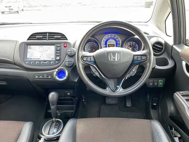 ホンダ フィット シャトル ハイブリッド ナビプレミアムセレ 富山県 2012(平24)年 5.1万km ポリッシュドメタルメタリック 純正HDDナビ/ワンセグTV/バックカメラ/ETC/クルーズコントロール/前後ドライブレコーダー/HID/スマートキー/社外15インチAW/ハーフレザー