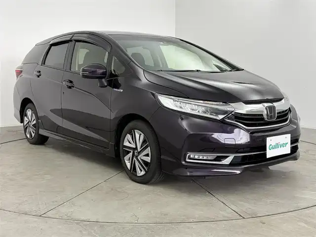 ホンダ シャトル ハイブリッド X ホンダセンシング 愛知県 2020(令2)年 5.5万km プレミアムベルベットパープル・パール ホンダセンシング/レーダークルーズコントロール/社外ナビ/（CD/DVD/BT/フルセグ）/USB入力/バックカメラ/ビルトインETC/自動防眩/パドルシフト/ステアスイッチ/LEDヘッドライト/フォグランプ/スペアキー