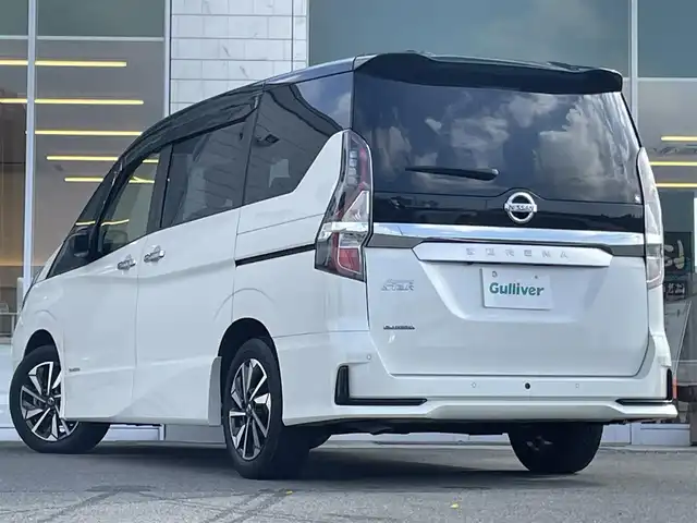 日産 セレナ ハイウェイスター V 兵庫県 2022(令4)年 3.8万km ブリリアントホワイトパール 2トーン 純正１０インチナビ/後席モニター（フリップダウン）/両側パワースライドドア/プロパイロット/Bluetooth接続/バックカメラ/純正フロアマット/純正アルミホイール/ハンズフリー/ビルトインETC/エマージェンシーブレーキ/LEDヘッドライト/オートホールド/USB入力端子/前方ドライブレコーダー/スイッチスタート/フルセグTV