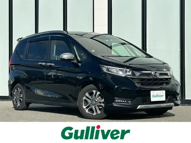 ホンダ フリード ハイブリット クロスター 大阪府 2023(令5)年 1.2万km クリスタルブラックパール 純正ナビ　/・フルセグTV/USB/BT/DVD/ホンダセンシング　/バックカメラ　/前後ドライブレコーダー /ビルトインETC /両側パワースライドドア /D/N席シートヒーター/ハーフレザーシート /LEDヘッド /純正15インチAW /純正フロアマット/カーテンエアバック/スペアキー/保証書・取説