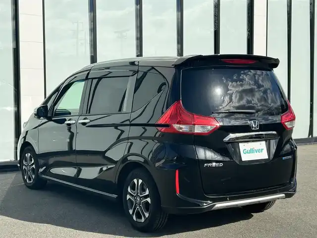 ホンダ フリード ハイブリット クロスター 大阪府 2023(令5)年 1.2万km クリスタルブラックパール 純正ナビ　/・フルセグTV/USB/BT/DVD/ホンダセンシング　/バックカメラ　/前後ドライブレコーダー /ビルトインETC /両側パワースライドドア /D/N席シートヒーター/ハーフレザーシート /LEDヘッド /純正15インチAW /純正フロアマット/カーテンエアバック/スペアキー/保証書・取説