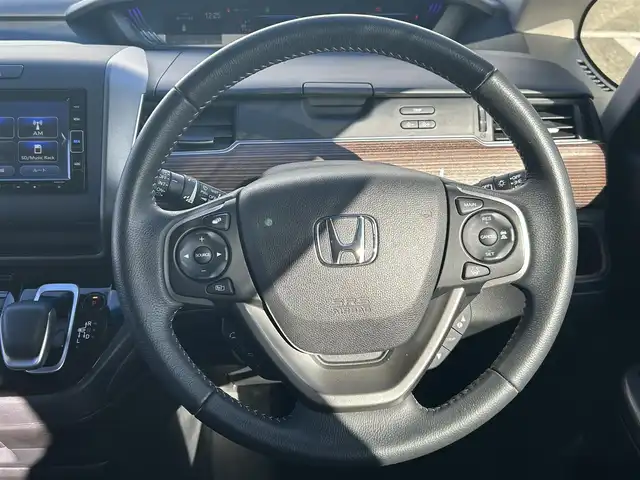 ホンダ フリード ハイブリット クロスター 大阪府 2023(令5)年 1.2万km クリスタルブラックパール 純正ナビ　/・フルセグTV/USB/BT/DVD/ホンダセンシング　/バックカメラ　/前後ドライブレコーダー /ビルトインETC /両側パワースライドドア /D/N席シートヒーター/ハーフレザーシート /LEDヘッド /純正15インチAW /純正フロアマット/カーテンエアバック/スペアキー/保証書・取説