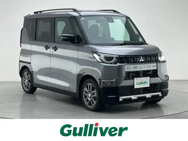 三菱 デリカミニ G プレミアム 兵庫県 2024(令6)年 0.4万km グレー 純正9インチメモリナビ　（MM223D-LM）/（FM/AM、BT、フルセグ）/両側パワースライドドア/マイパイロット/純正ドライブレコーダー/電動格納ミラー/ウィンカーミラー/デジタルインナーミラー/ステアリングヒーター/ハーフレザー/シートヒーター（D/N席）/ルーフレール/電動パーキング/オートブレーキホールド/ACC/LKA/FCM/LDW/踏み間違い防止/オートライト/LEDヘッドライト/LEDフォグランプ/純正フロアマット/プッシュスタート/スマートキー/純正15インチAW