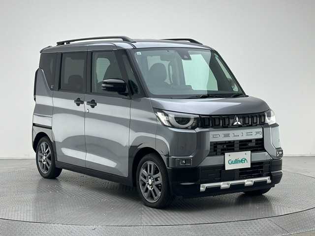 三菱 デリカミニ G プレミアム 兵庫県 2024(令6)年 0.4万km グレー 純正9インチメモリナビ　（MM223D-LM）/（FM/AM、BT、フルセグ）/両側パワースライドドア/マイパイロット/純正ドライブレコーダー/電動格納ミラー/ウィンカーミラー/デジタルインナーミラー/ステアリングヒーター/ハーフレザー/シートヒーター（D/N席）/ルーフレール/電動パーキング/オートブレーキホールド/ACC/LKA/FCM/LDW/踏み間違い防止/オートライト/LEDヘッドライト/LEDフォグランプ/純正フロアマット/プッシュスタート/スマートキー/純正15インチAW