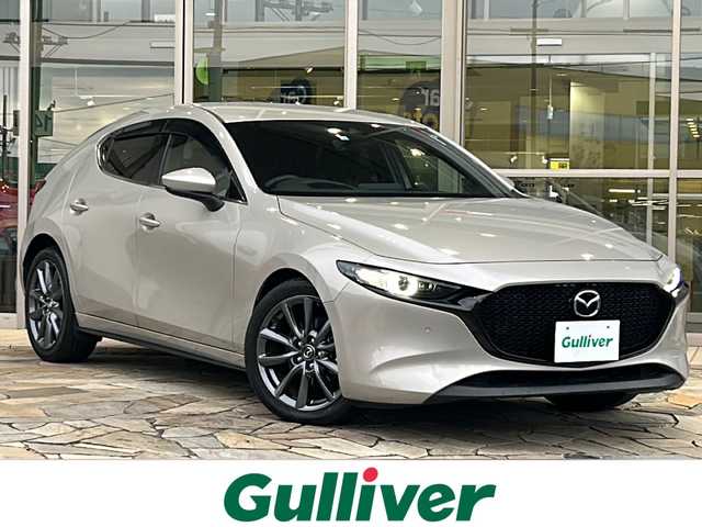 マツダ マツダ３ファストバック XD プロアクティブ ツーリングS 静岡県 2022(令4)年 1.7万km プラチナクォーツメタリック 純正ナビ/・FM/・AM/・フルセグTV/・USB/・CD/・DVD/・メモリーオーディオ/・HDMI/主要装備/・ＥＴＣ/・全方位カメラ/・レーダークルコン/・運転席＋助手席シートヒーター/・パドルシフト/・ハンドルヒーター/・サイドカーテンエアバッグ/・運転席パワーシート/・横滑り防止装置/・アイドリングストップ/・LEDヘッドライト/・オートハイビーム