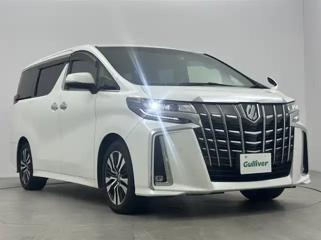 トヨタ アルファード S Cパッケージ 大阪府 2021(令3)年 3.1万km ホワイトパールクリスタルシャイン ワンオーナー/純正ディスプレイオーディオ/（CD/DVD/BT/フルセグ/HDMI）/純正フリップダウンモニター/トヨタセーフティセンス/ETC/バックカメラ/デジタルインナーミラー/両側パワースライドドア/パワーシート/シートヒーター/エアシート/ステアリングヒーター/ウッドエンビハンドル/オットマン/純正AW/純正フロアマット