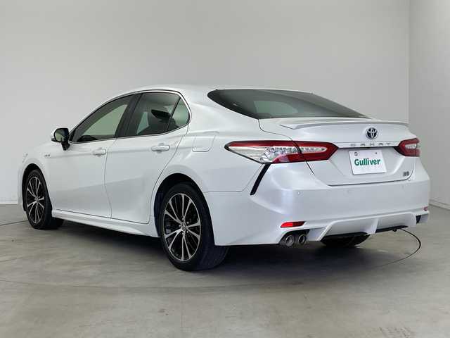 トヨタ カムリ WSレザーパッケージ 新潟県 2019(平31)年 4.2万km プラチナホワイトパールマイカ 純正SDナビ/　DVD/CD/Bluetooth/FM/AM/フルセグTV/トヨタセーフティセンス/・プリクラッシュセーフティ/・レーダークルーズコントロール/・レーントレーシングアシスト/・オートマチックハイビーム/・ロードサインアシスト/リアクロストラフィックアラート/前後コーナーセンサー/ヘッドアップディスプレイ/ブラインドスポットモニター/電動リアゲート/前席シートヒーター/前席パワーシート/レザーシート/LEDヘッドライト/オートライトハイビーム/レザーステアリング/ステアリングスイッチ