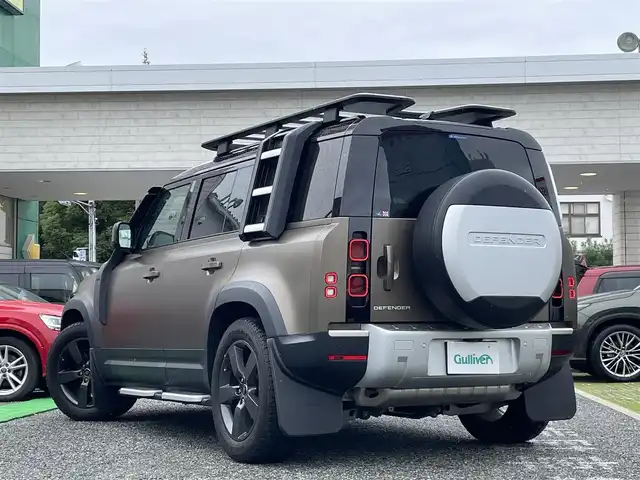 ランドローバー ランドローバー ディフェンダー 110SE 兵庫県 2021(令3)年 1.2万km ベージュ /ワンオーナー//カラー ゴンドワナストーン（1DK）//内装エイコーン/ルナ//EXPRORER PACK（UP GLADE）/ エクステリアサイドマウントギアキャリア/ エクスペディションルーフラック/ レイズドエアインテーク/ フロントエクスペディションプロテクションシステム/ フィックスドサイドステップ/ デプロイアブルルーフラダー//URBAN PACK/ フットペダル（ブライトメタル）/ スペアホイールカバー/ ブライトリアスカッフプレート/OP:/ サテンプロテクションフィルム/ スライディングパノラミックルーフ/ フロント/リヤクラシックマッドフラップ/ フルハイトラゲッジスペースパーテーション/ インテグレーテッドエアコンプレッサー/ アクティビティキー//エアサスペンション//純正ナビ//Bluetooth/Apple Car Play//MERIDIANスピーカー//3Dサラウンドカメラ（360度モニター）//ClearSightインテリアリアビューミラー//エマージェンシーブレーキ//レーンキープ//ドライバーコンディションモニター//パーキングエイド//リヤトラフィックモニター//ブラインドスポットアシスト//ACC//オートハイビームアシスト//R4/5/6/7ディーラー点検記録