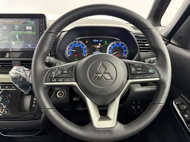 三菱 デリカミニ T プレミアム 愛知県 2025(令7)年 0.1千km アイボリー 届出済未使用車/4WD/ターボ/e-Assist/・衝突軽減ブレーキシステム/・車線逸脱警報システム/・オートマチックハイビーム/・ふらつき警報/マイパイロット/・レーダークルーズコントロール/・車線維持支援システム/純正9インチディスプレイオーディオ/マルチアラウンドモニター/革巻きステアリング/ステアリングリモコン/ステアリングヒーター/ハーフレザーシート/シートヒーター/両側パワースライドドア/純正LEDヘッドライト/フォグランプ/純正15インチアルミホイール/取扱説明書/保証書/スペアキー