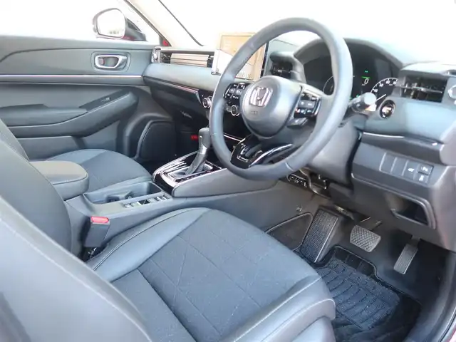 ホンダ ヴェゼル ハイブリッド e:HEV Z 石川県 2025(令7)年 0.3万km プレミアムクリスタルレッドM プッシュスタート/スマートキー2本/アクティブクルーズコントロール/ステアリングヒーター/パーキングセンサー/ハンズフリーアクセスパワーゲート/パドルシフト/ビルトインETC/Fシートヒーター/FRソナーセンサー/黒ハーフレザーシート/ヒルディセントコントロール/アダプティブドライビングビーム/ドアバイザー/Fフォグランプ/純正フロアマット