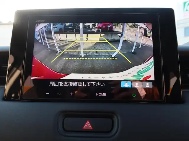 ホンダ ヴェゼル ハイブリッド e:HEV Z 石川県 2025(令7)年 0.3万km プレミアムクリスタルレッドM プッシュスタート/スマートキー2本/アクティブクルーズコントロール/ステアリングヒーター/パーキングセンサー/ハンズフリーアクセスパワーゲート/パドルシフト/ビルトインETC/Fシートヒーター/FRソナーセンサー/黒ハーフレザーシート/ヒルディセントコントロール/アダプティブドライビングビーム/ドアバイザー/Fフォグランプ/純正フロアマット