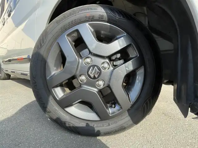 スズキ スペーシア ギア HYBRID XZターボ 東京都 2024(令6)年 1万km ベージュⅡ ワンオーナー　/純正９型メモリナビ＆フルセグ /・BluetoothAudio/・AppleCarPlay＆AndroidAuto/ヘッドアップディスプレィ /アラウンドビューモニター /両側パワースライドドア　/前席シートヒーター /ステアリングヒーター /セーフティサポート /（予防安全技術）/・デュアルカメラブレーキサポート２/・誤発進抑制機能/・低速時ブレーキホールド/・車線逸脱警報機能/・アダプティブクルーズコントロール/・標識認識機能/・発進お知らせ機能/LEDヘッドライト /Wエアバック＆ABS/保証書＆取説