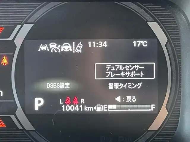 スズキ スペーシア ギア HYBRID XZターボ 東京都 2024(令6)年 1万km ベージュⅡ ワンオーナー　/純正９型メモリナビ＆フルセグ /・BluetoothAudio/・AppleCarPlay＆AndroidAuto/ヘッドアップディスプレィ /アラウンドビューモニター /両側パワースライドドア　/前席シートヒーター /ステアリングヒーター /セーフティサポート /（予防安全技術）/・デュアルカメラブレーキサポート２/・誤発進抑制機能/・低速時ブレーキホールド/・車線逸脱警報機能/・アダプティブクルーズコントロール/・標識認識機能/・発進お知らせ機能/LEDヘッドライト /Wエアバック＆ABS/保証書＆取説