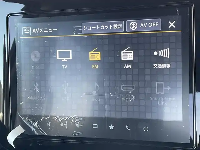 スズキ スペーシア ギア HYBRID XZターボ 東京都 2024(令6)年 1万km ベージュⅡ ワンオーナー　/純正９型メモリナビ＆フルセグ /・BluetoothAudio/・AppleCarPlay＆AndroidAuto/ヘッドアップディスプレィ /アラウンドビューモニター /両側パワースライドドア　/前席シートヒーター /ステアリングヒーター /セーフティサポート /（予防安全技術）/・デュアルカメラブレーキサポート２/・誤発進抑制機能/・低速時ブレーキホールド/・車線逸脱警報機能/・アダプティブクルーズコントロール/・標識認識機能/・発進お知らせ機能/LEDヘッドライト /Wエアバック＆ABS/保証書＆取説