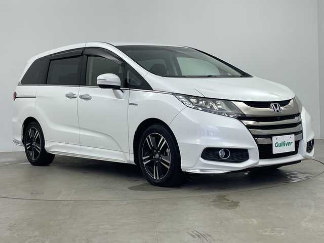 ホンダ オデッセイ ハイブリッド アブソルートセンシングEXパック 鹿児島県 2017(平29)年 3.7万km ホワイトオーキッドパール Honda SENSING/●衝突軽減ブレーキ 〈CMBS〉/●歩行者事故低減ステアリング/●ACC 〈アダプティブ・クルーズ・コントロール〉/●LKAS 〈車線維持支援システム〉/●路外逸脱抑制機能/●誤発進抑制機能/●先行車発進お知らせ機能/●標識認識機能/HondaインターナETC車載器（ナビ連動）/マルチビューカメラシステム/スマートパーキングアシストシステム/手動開閉リアエンターテインメントシステム/両側パワースライドドア/LEDルームランプ/LEDヘッドライト/コンフォートビューパッケージ/サイドエアバッグ＋サイドカーテンエアバッグ/純正17インチアルミホイール/ブラインドスポットインフォメーション/アクティブコーナリングライト/センターコンソールボックス/大型アームレスト/AC電源1500W/2列目大型ロールサンシェード/オートパワーウィンドウ/本革巻きステアリングホイール/運転席8ウェイパワーシート/LEDアウターウエルカムライト