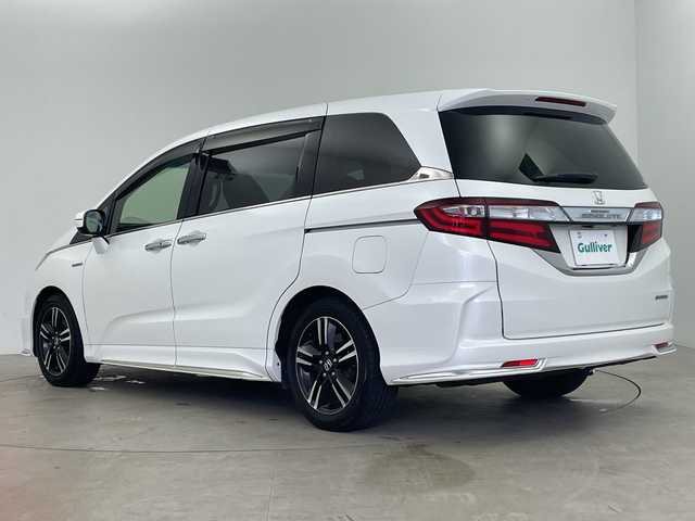 ホンダ オデッセイ ハイブリッド アブソルートセンシングEXパック 鹿児島県 2017(平29)年 3.7万km ホワイトオーキッドパール Honda SENSING/●衝突軽減ブレーキ 〈CMBS〉/●歩行者事故低減ステアリング/●ACC 〈アダプティブ・クルーズ・コントロール〉/●LKAS 〈車線維持支援システム〉/●路外逸脱抑制機能/●誤発進抑制機能/●先行車発進お知らせ機能/●標識認識機能/HondaインターナETC車載器（ナビ連動）/マルチビューカメラシステム/スマートパーキングアシストシステム/手動開閉リアエンターテインメントシステム/両側パワースライドドア/LEDルームランプ/LEDヘッドライト/コンフォートビューパッケージ/サイドエアバッグ＋サイドカーテンエアバッグ/純正17インチアルミホイール/ブラインドスポットインフォメーション/アクティブコーナリングライト/センターコンソールボックス/大型アームレスト/AC電源1500W/2列目大型ロールサンシェード/オートパワーウィンドウ/本革巻きステアリングホイール/運転席8ウェイパワーシート/LEDアウターウエルカムライト