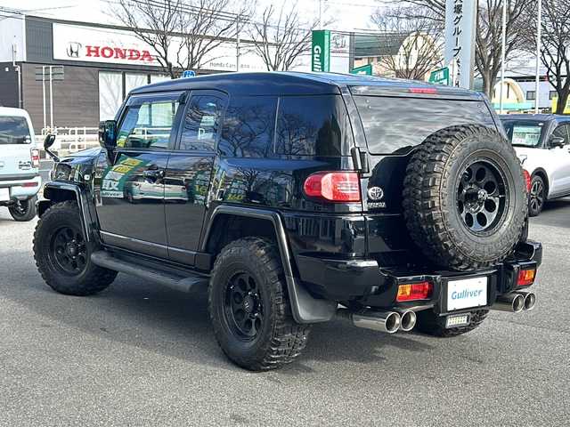 トヨタ ＦＪクルーザー 鳥取県 2012(平24)年 6.3万km ブラック/ホワイト VSC&TRC/（Vehicle Stability Control & Traction Control）/SRSサイド＆カーテンエアバッグ/前後席3点式シートベルト/マニュアルエアコン/ワイヤレスドアロックリモートコントロール/バックソナー/1GR-FE型 4.0L V6エンジン/本格的な4WDシステム（パートタイム4WD）/ビルシュタイン製モノチューブダンパー（X-REAS装着車）/社外ナビ/AM/FM、CD/DVD/フルセグTV、Bluetooth、/ドアバイザー/ETC/iPod