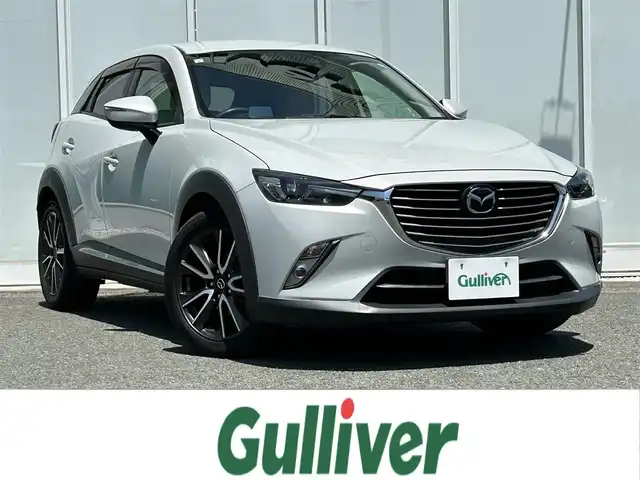 マツダ ＣＸ－３ XD ツーリング Lパッケージ 福岡県 2015(平27)年 10.6万km セラミックM ・純正ナビ（フルセグ・Bluetooth・DVD）/・バックカメラ/・ETC/・クルーズコントロール/・横滑り防止装置/・盗難防止装置/・HUD/・BMS/・D/N席シートヒーター/・ハーフレザーシート/・LEDヘッドライト/・オートライト/・ステアリングスイッチ/・パドルシフト/・電格ミラー
